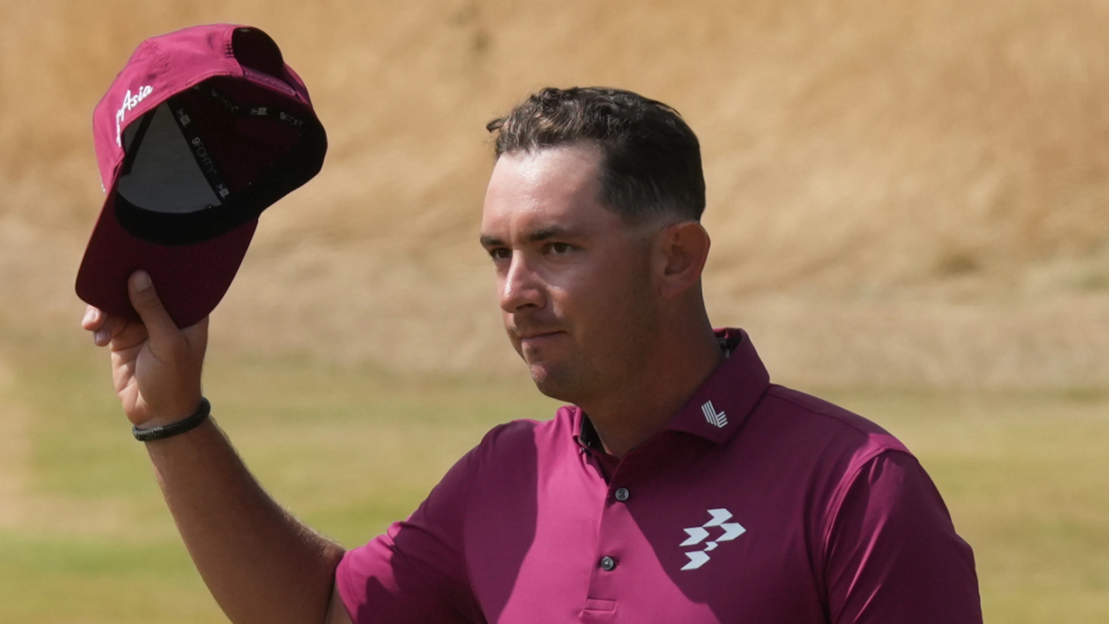 Australia's Lucas Herbert plays an outstanding round on the second day of the British Open and takes the lead