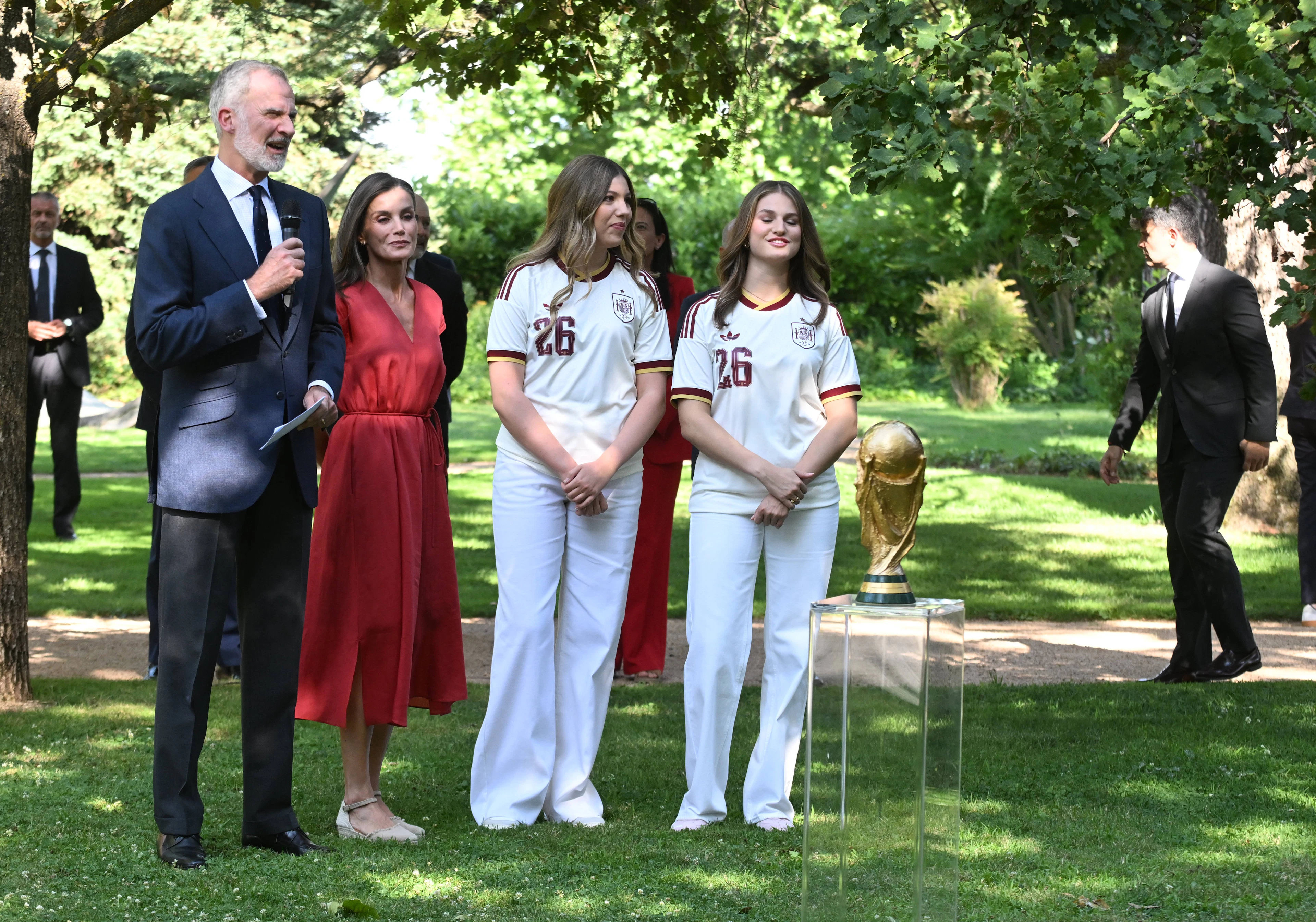 A Proud Royal Family: Dad Felipe offers a few kind words to the Spanish World Cup champions, with his wife and two daughters standing beside him.