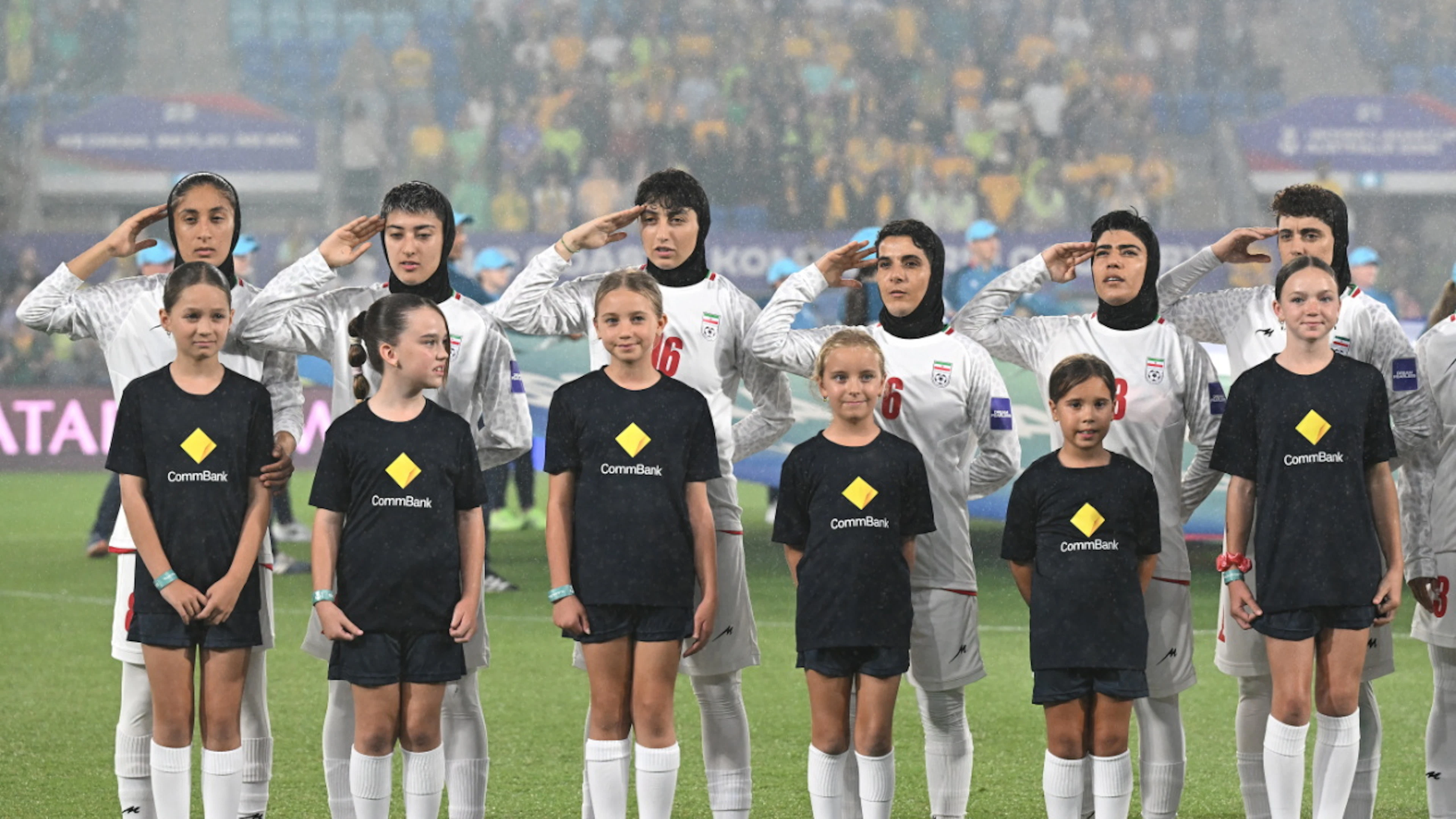 Iran's women's soccer team saluting during the national anthem last March