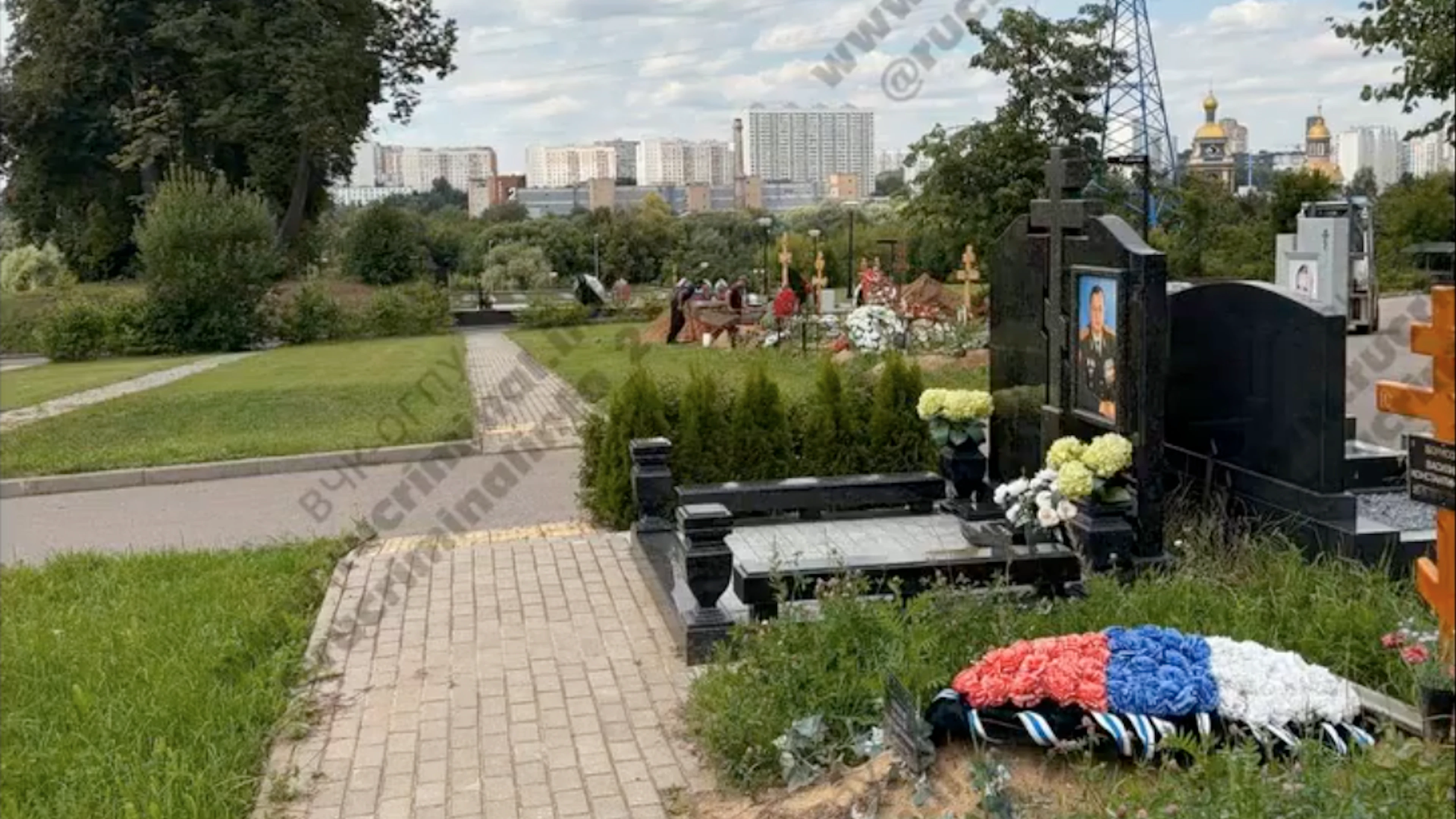 This photo is said to show a fresh grave at Moscow's Troekurovo Cemetery, where a victim of the August 1 attack in Moscow was buried.