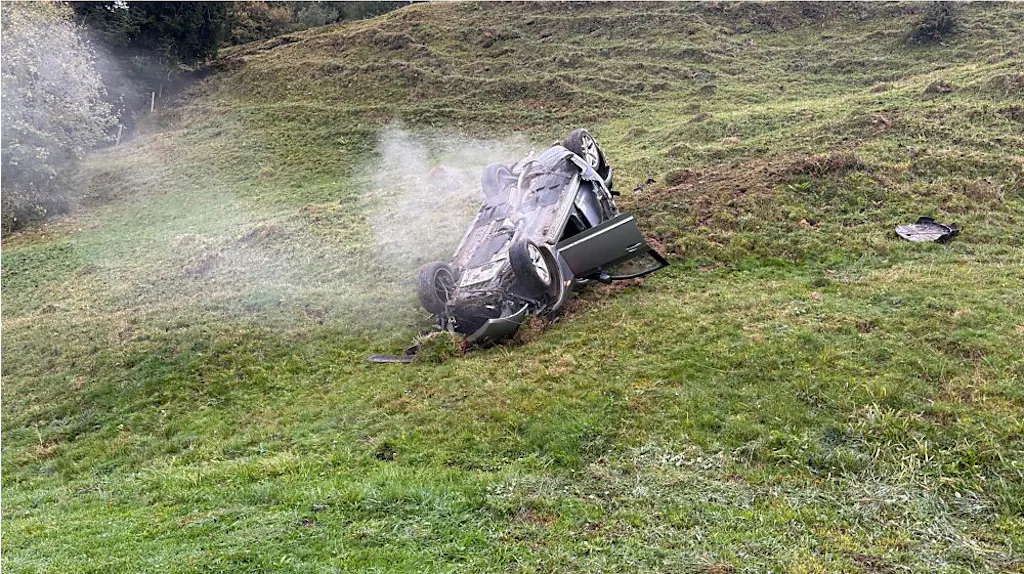 Car rolls 100 metres down slope and overturns in Galgenen