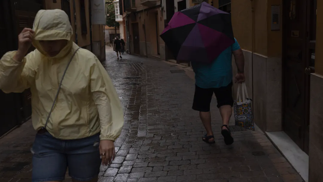 Severe Weather in Spain: People Wait on Rooftops for Rescue
